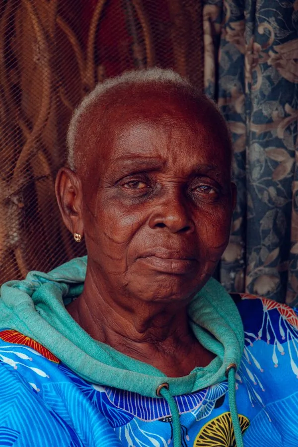 Older woman seated comfortably at home